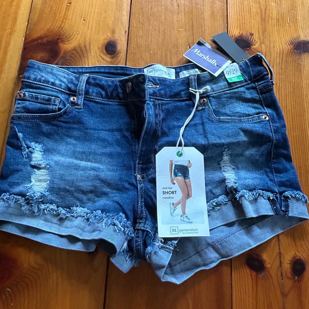 Brand new dark blue Jean shorts with rips